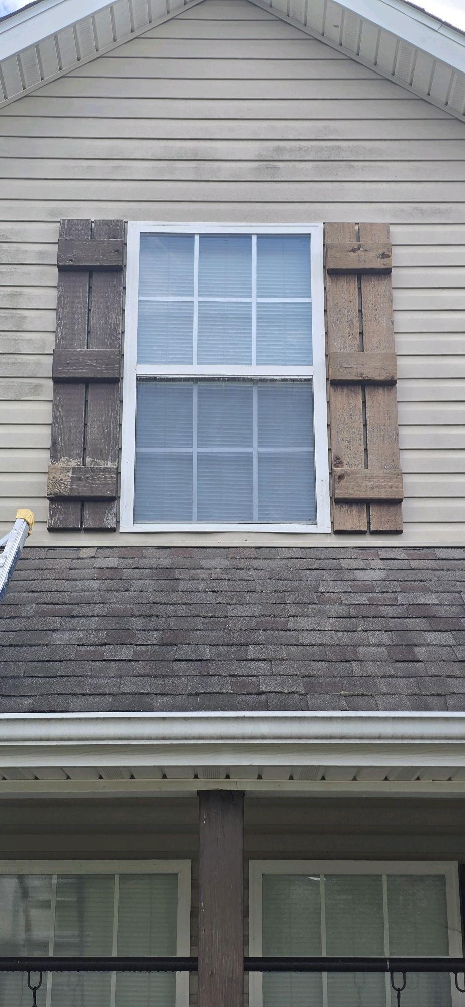 Before Pressure Wash & Exterior Staining — faded exterior with weathered posts and shutters